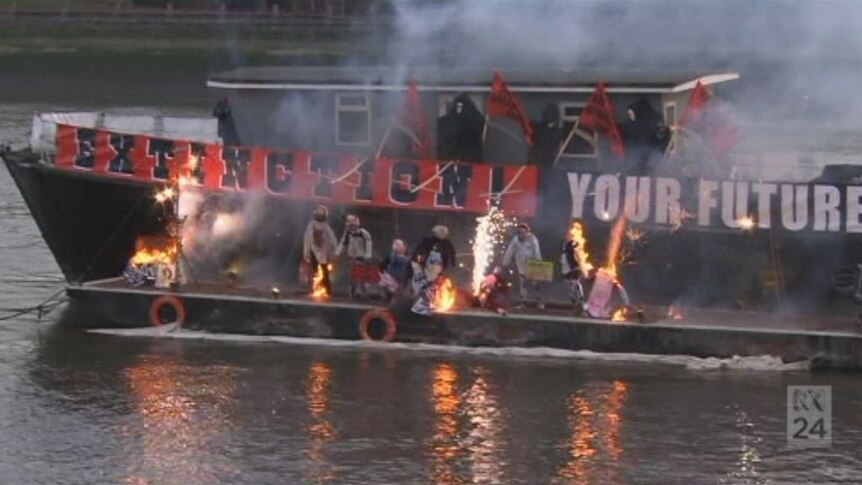 Punk memorabilia burns on the River Thames