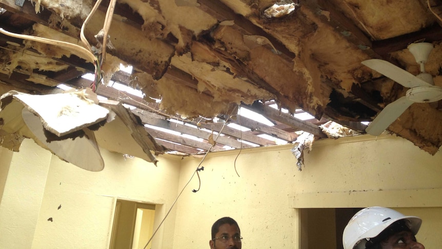 Rohith Yalamanchali inside his Roebourne home with a collapsed ceiling