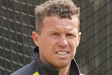 Peter Siddle looks on during training in the MCG nets