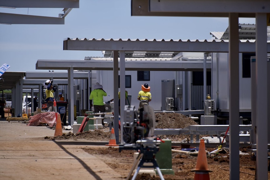 Tradies at a facility.