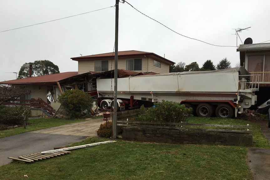 A house partly demolished by a truck in Scottsdale