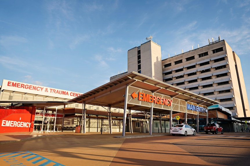 A photo showing hospital exterior with emergency and main enterance signs  at the front