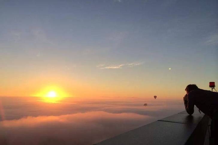 A sunrise over fog