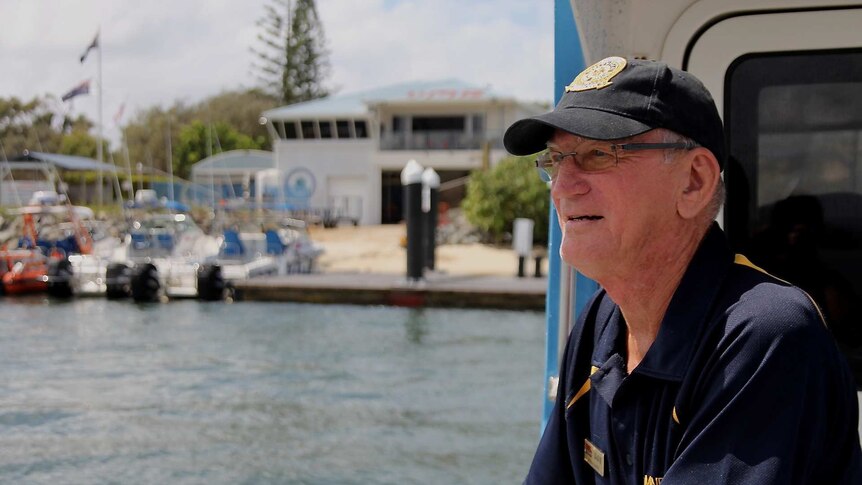 Volunteer Marine Rescue skipper Dave MacDonald looking towards boats on the Broadwater