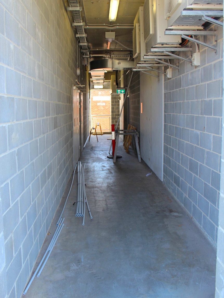 A walkway with construction equipment at Busselton Health Campus in Western Australia.