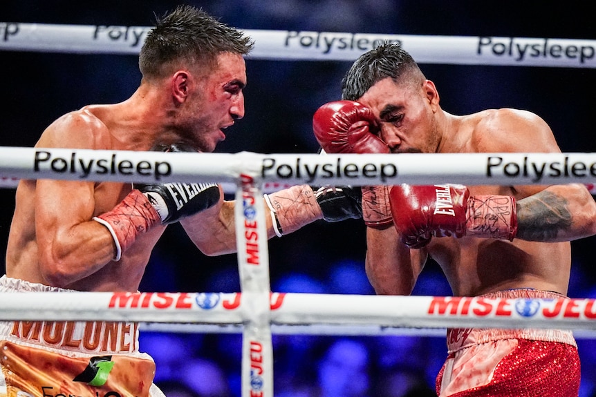 Jason Moloney lands a punch on Saul Sanchez during a boxing match