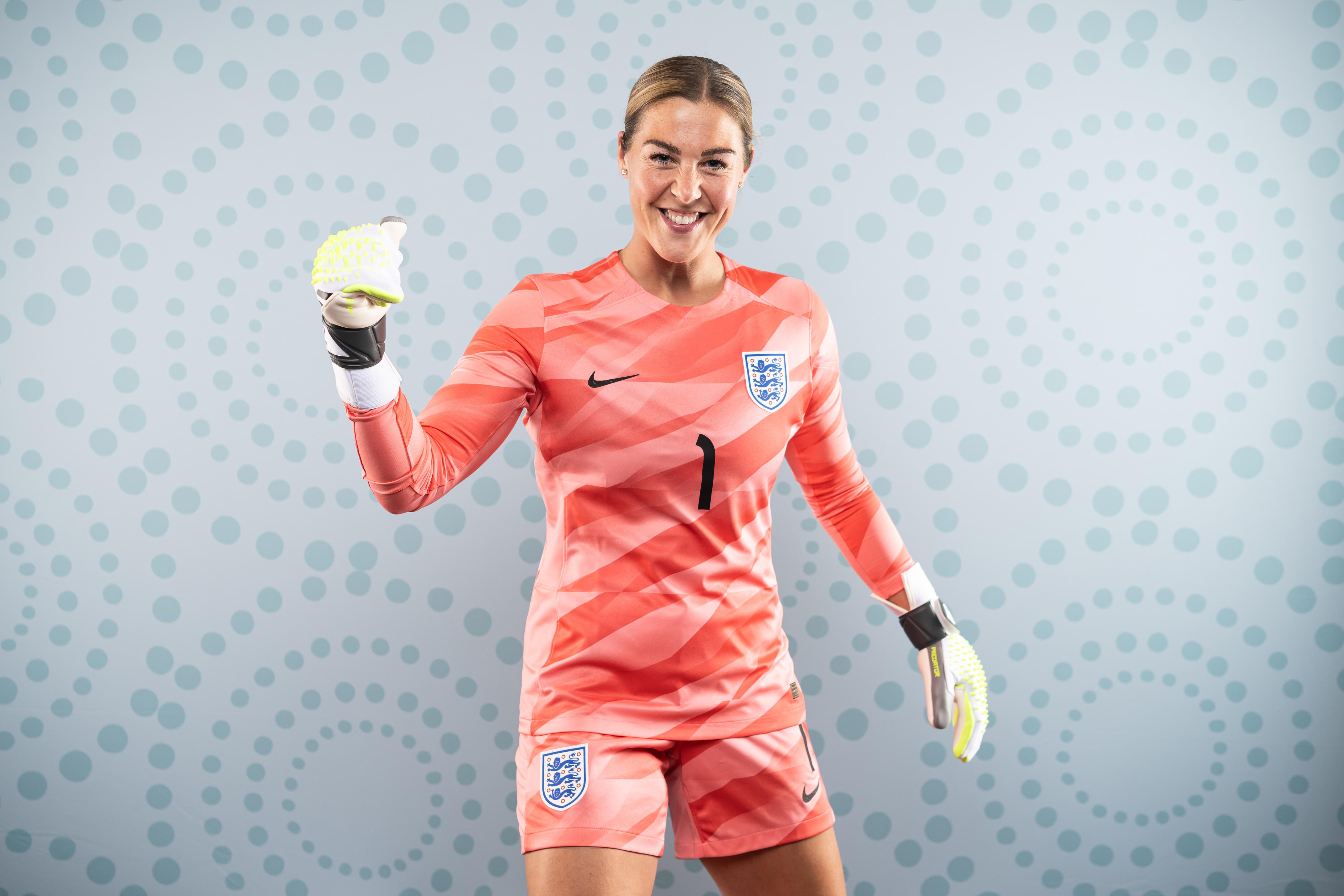 A woman poses for a photo.