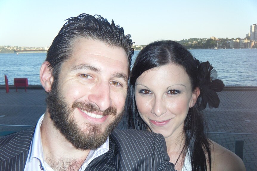 Gary and Renee take a selfie next to Sydney Harbour