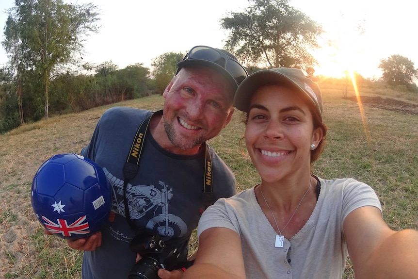 A couple takes a selfie