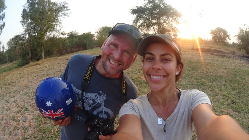 A couple takes a selfie