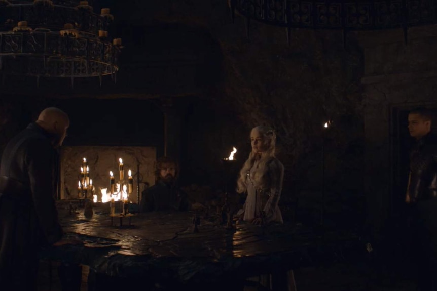 A still image of Daenerys Targaryen and her advisors from HBO's Game of Thones