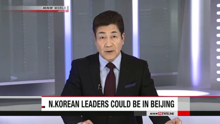 A newsreader in Japan talks about speculation that North Korean leaders have arrived in China