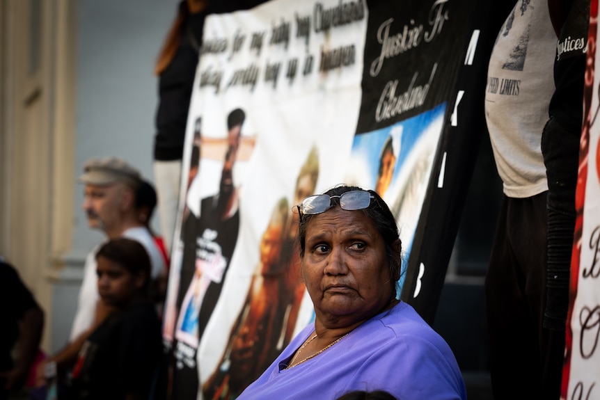 Cleveland Dodd's grandmother Glenda Mippy sits outside the court where the inquest is being held.