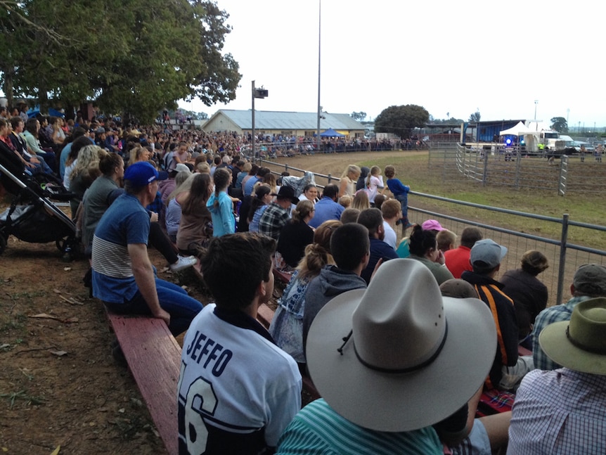 A crowd of more than 2,000 line the ring to watch the bull riding action.