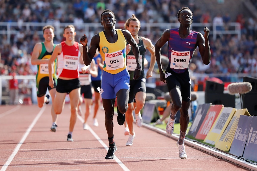 Peter Bol and Joseph Deng race.