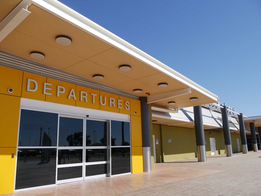 departures airport sign at a regional airport