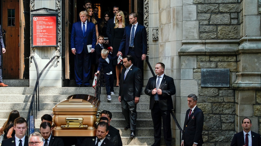 Donald Trump leads his family behind the casket of Ivana Trump.