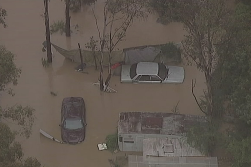 Cars submerged as Georges River rises in Sydney's south-west
