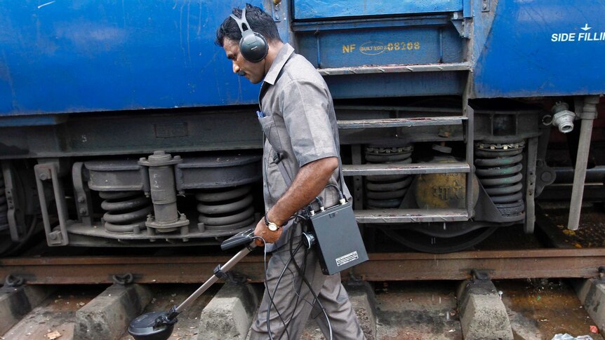 Bomb disposal squad checks Indian train after bombings