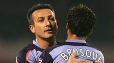 Two goals ... Alex Brosque is congratulated by fellow scorer Sasho Petrovski
