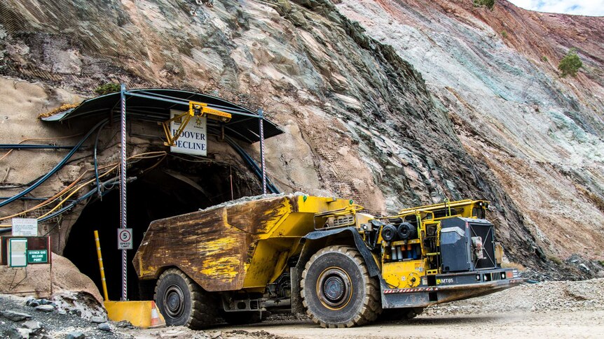 Truck emerges from underground gold mine.