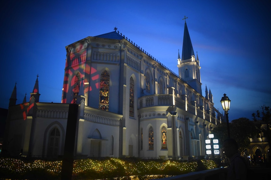 The facade of Chijmes central chapel at night time.