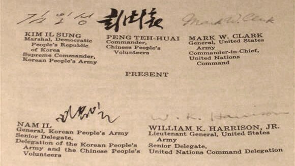 Photo of the English text of the Korean Armistice Agreement, with signatures at the bottom.