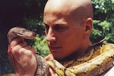Dr Bryan Grieg Fry with snake