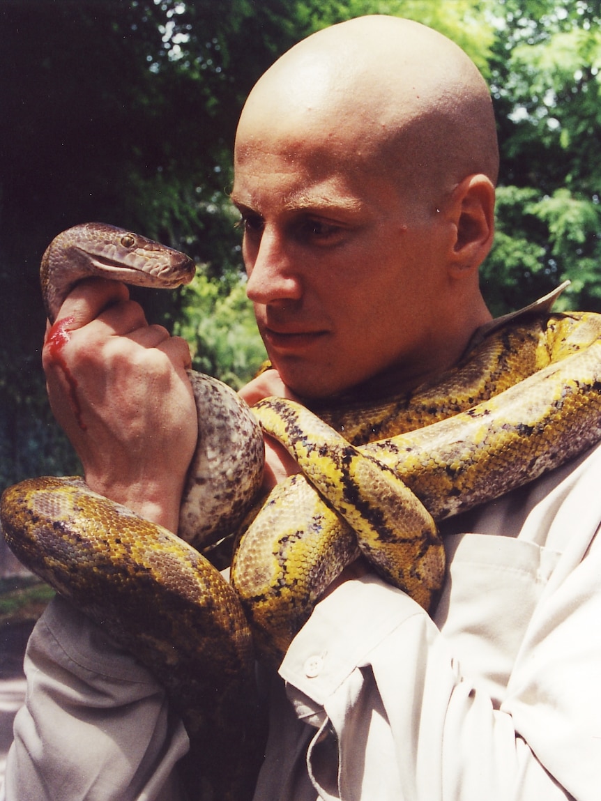 Dr Bryan Grieg Fry with snake