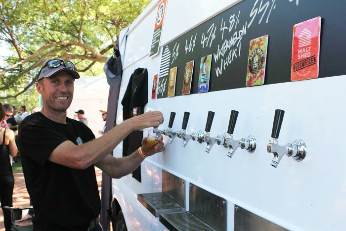 Andrew Bett pours a beer at the Great Australian Beer Festival in Albury