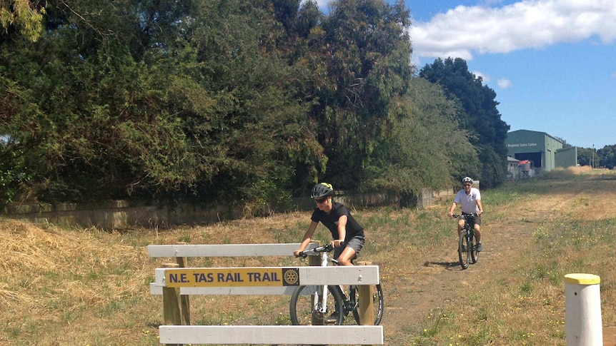 Cyclists approach the North-East rail trail in Tasmania