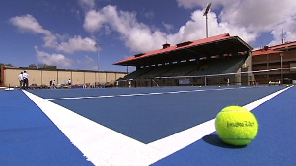 Ball lies near the side of a tennis court, 2007