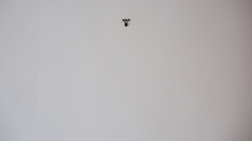 An empty hook on Helen Smith's wall.