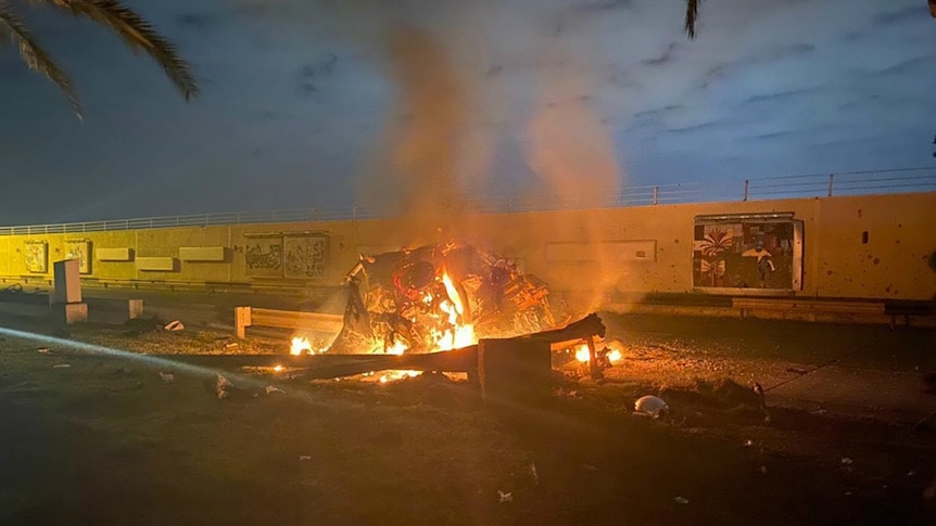 A burning vehicle at the Baghdad International Airport following an air strike by the US in Baghdad.