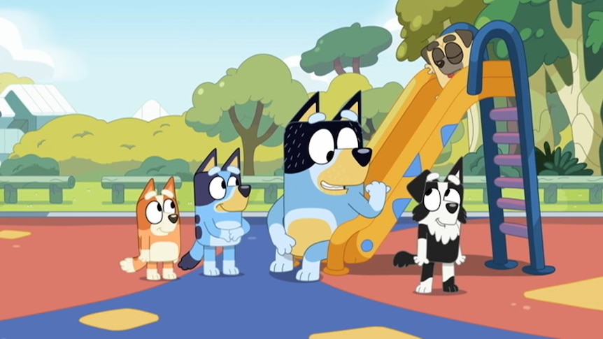 Bingo, Bluey, Dad and McKenzie in a playground and decide to go to the creek