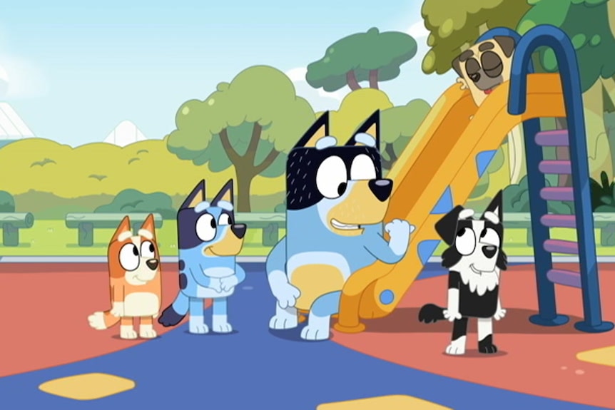 Bingo, Bluey, Dad and McKenzie in a playground and decide to go to the creek