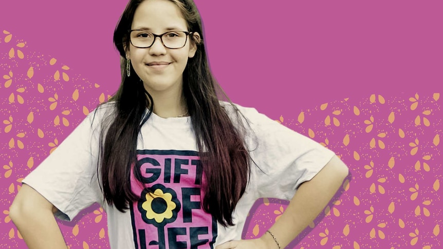Samantha wearing a t-shirt that says: Gift of Life.