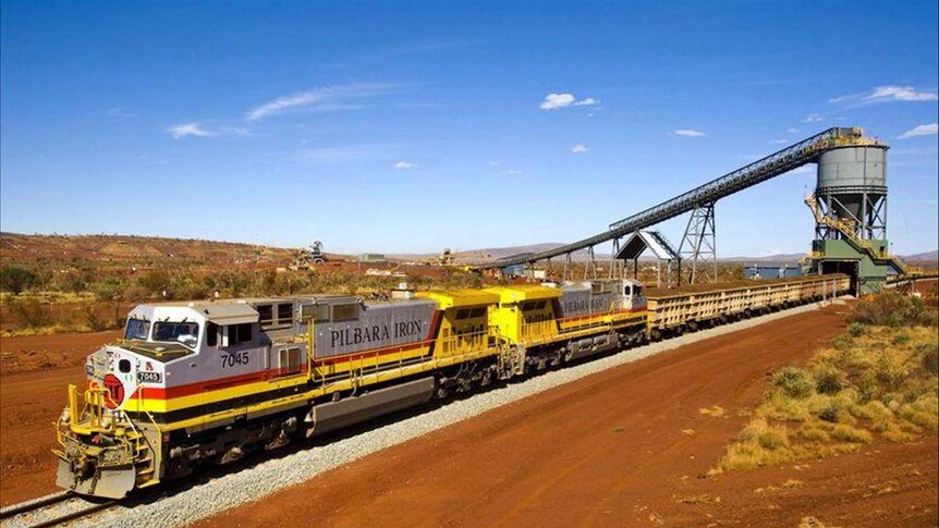 An iron ore train is loaded