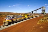 An iron ore train is loaded