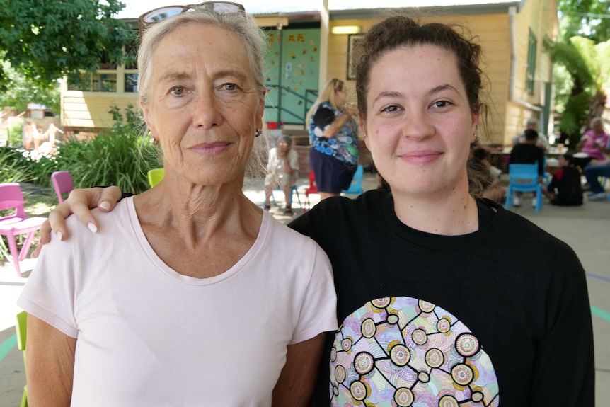 Two women smiling at the camera