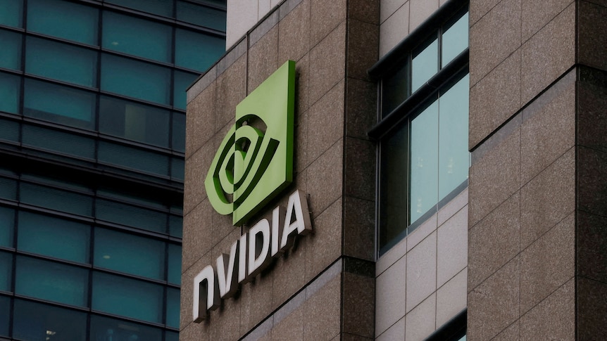 A green logo that reads "Nvidia" on the side of a brown building.
