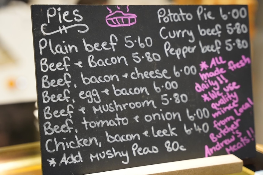 A bakery board showing a list of pies.