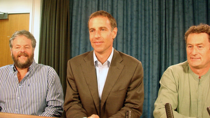 Tasmanian Greens Leader Nick McKim is flanked by Kim booth (l) and Tim Morris (r)