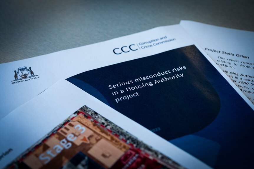 A picture of a Corruption and Crime Commission report into 'serious misconduct risks in a housing authority project'