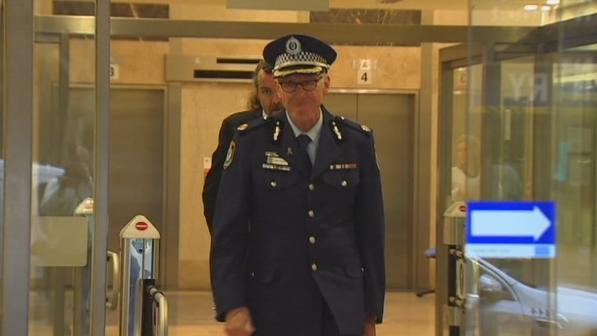 Assistant Police Commissioner Mark Murdoch walking outside of the Sydney siege inquest.