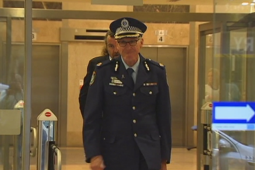 Assistant Police Commissioner Mark Murdoch walking outside of the Sydney siege inquest.