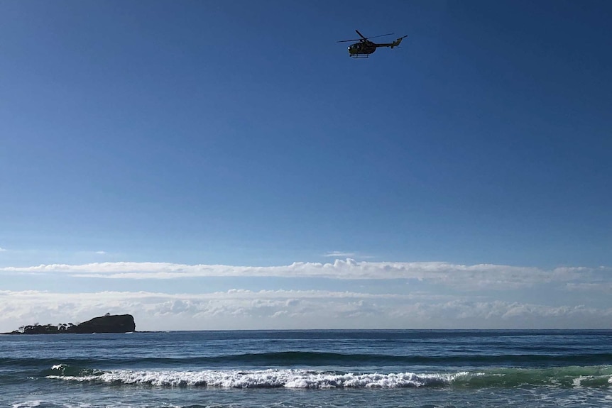 Helicopter above Twin Waters beach.