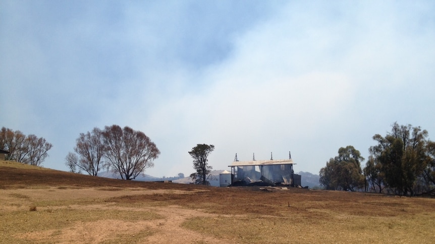 A burnt shed after a grassfire near Yass