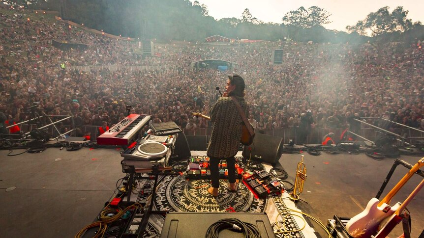 A view of the crowd and Tash Sultana performing on stage at Splendour In The Grass 2017