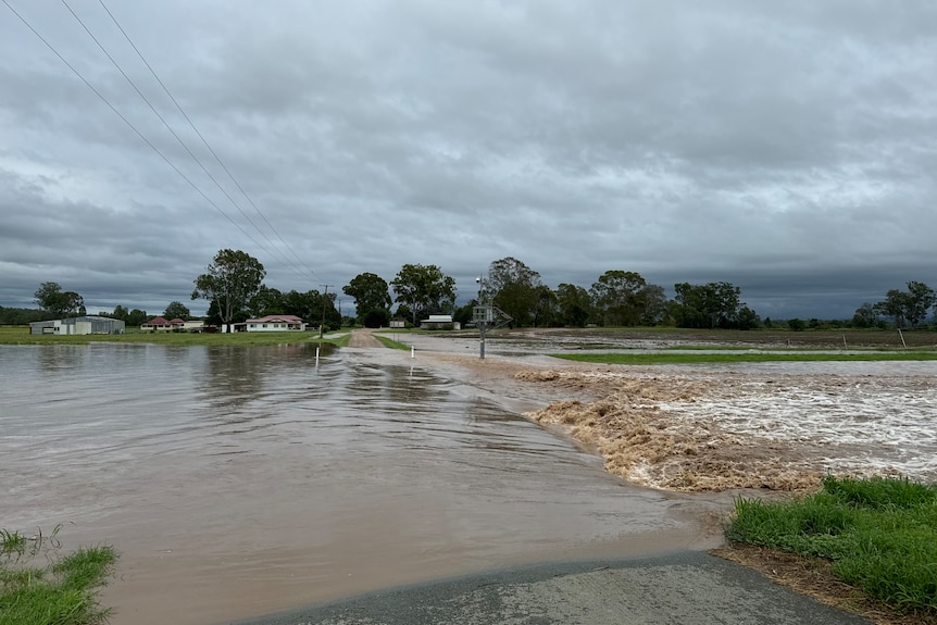 Floodwaters have cut low lying roads of Forest Hill and inundated cotton crops.